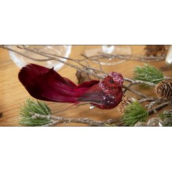 Rd deko fugl med glimmer.